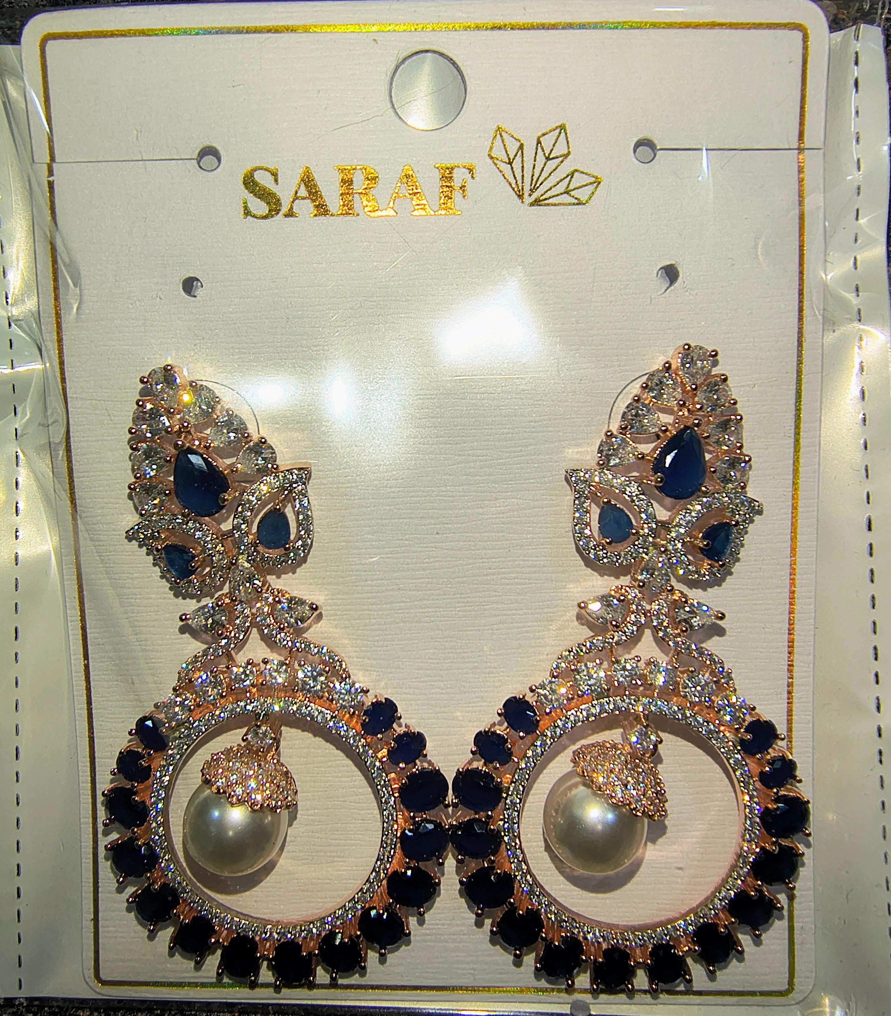 Rose Gold Plated Pearl With Blue Ad Studded Chandbali Drop Earrings