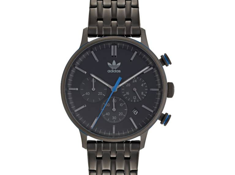 ADIDAS analog unisex quartz watch on fabric background
