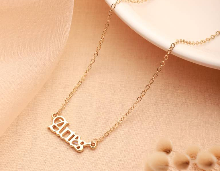 Gold zodiac constellation Aries necklace pendant on skin