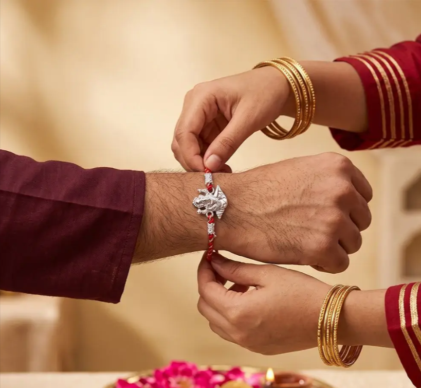 ZALKARI Silver Shankh Ganpati Rakhi (Adjustable).